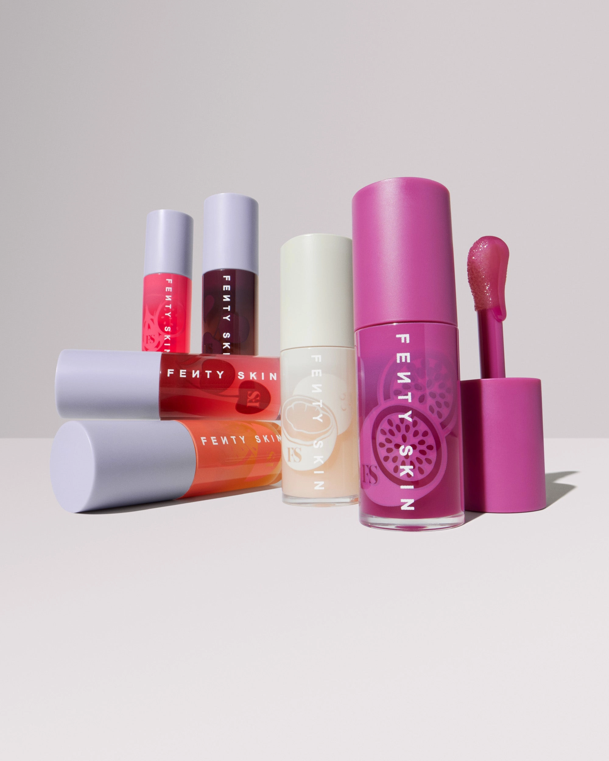 Fenty Treatz Hydrating   Strengthening Lip Oil — Passion Fruit